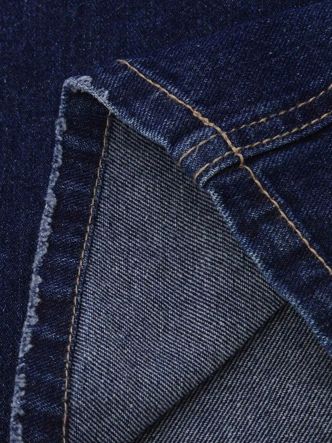 Distressed loose fit straight leg jeans with raw hem