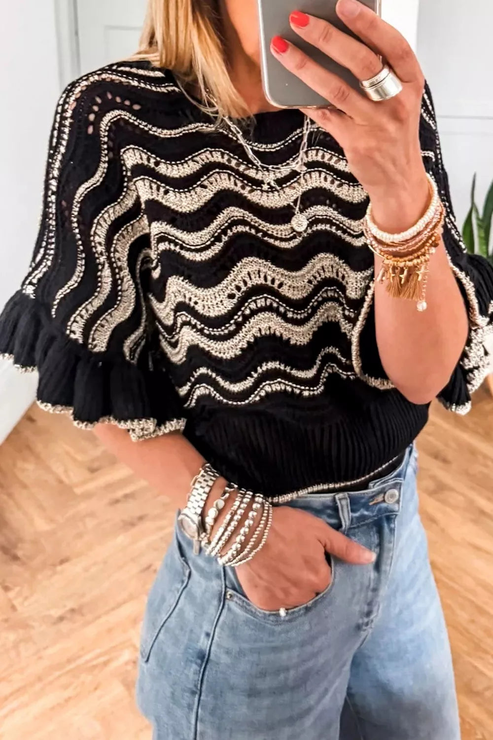 Openwork wave-knit sweater with tiered ruffle sleeves