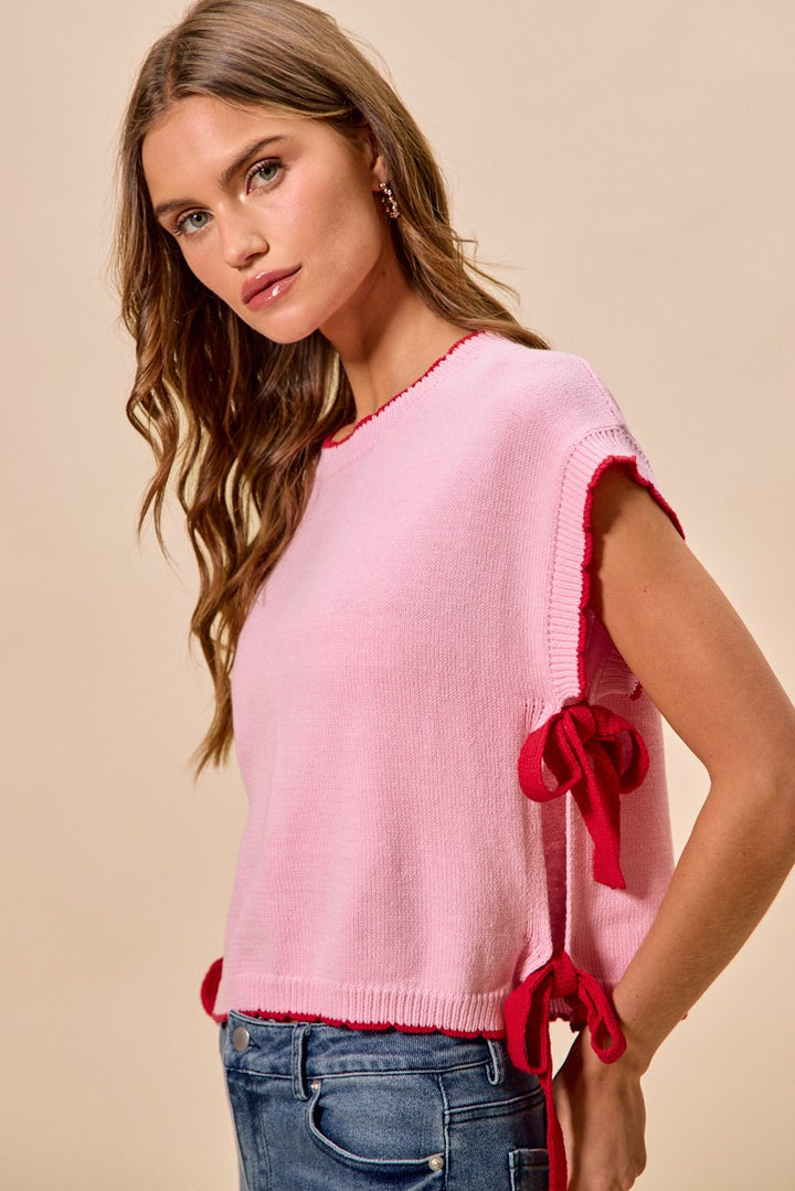 Dolman sleeve knit sweater top with side ribbon ties