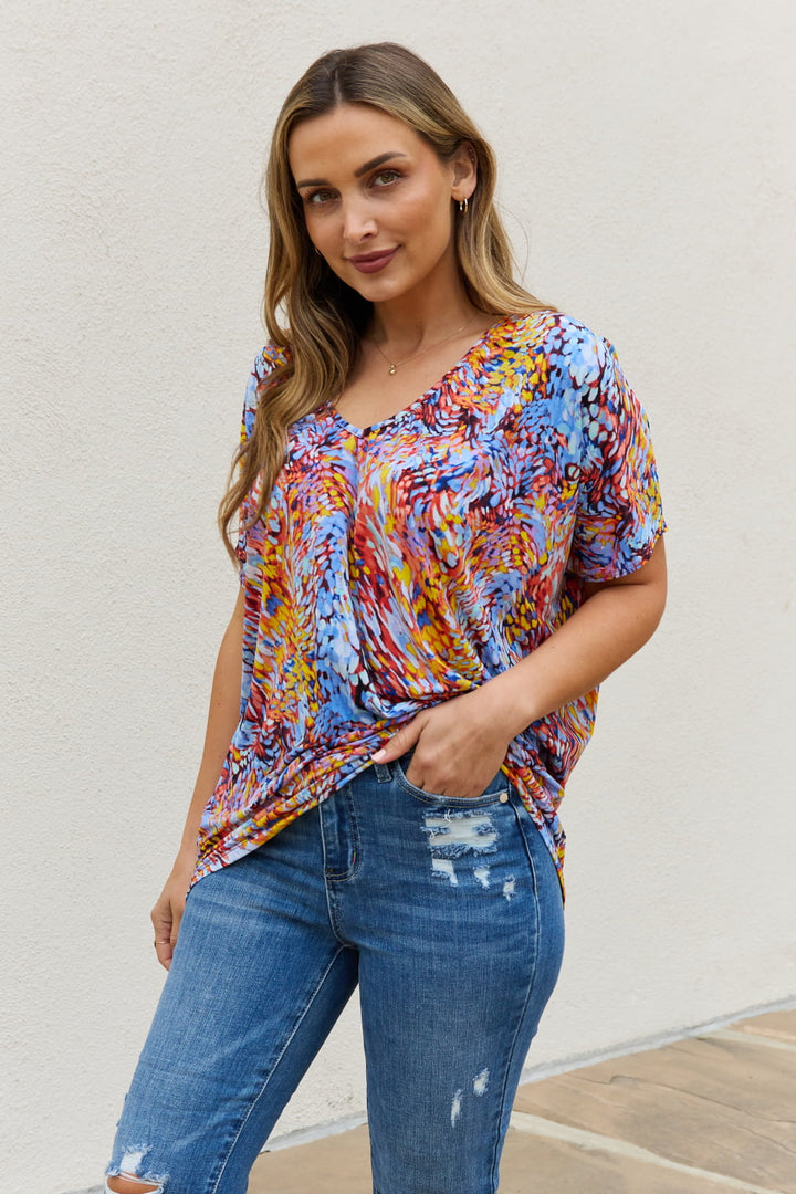 Abstract print dolman sleeve flowy V-neck top