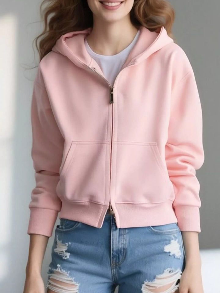 Pink Zip-up hoodie with front pockets and ribbed cuffs