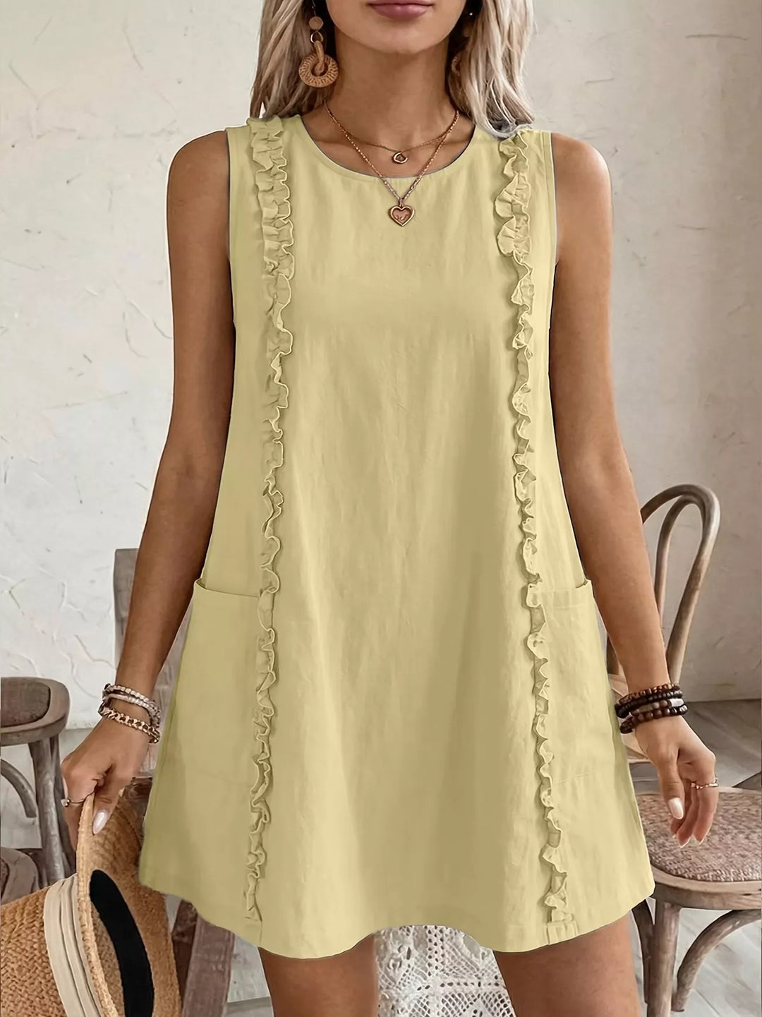 Pastel Yellow Ruffle-trim sleeveless mini dress with side pockets