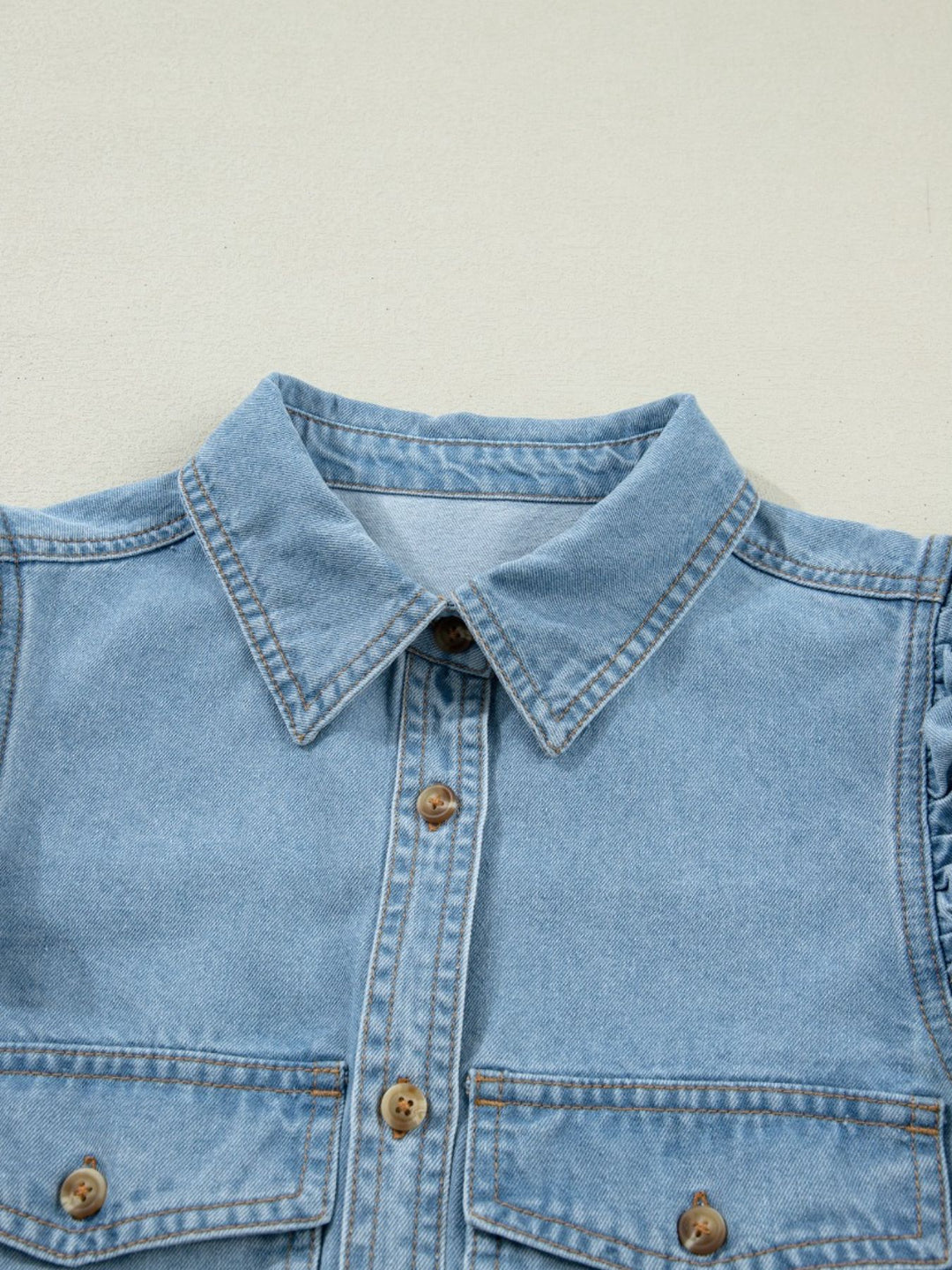 Ruffled cap-sleeve denim button-down shirt with flap pockets