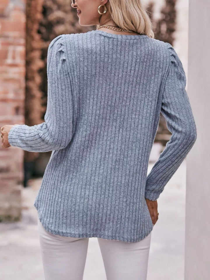 Ribbed knit long sleeve top with puff shoulders