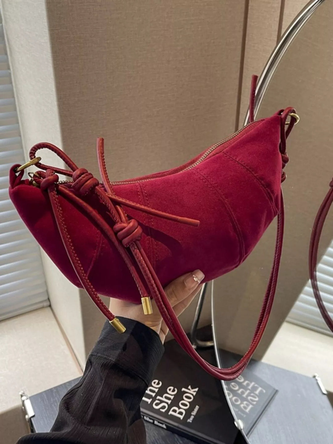 Crescent suede-look crossbody bag with knotted strap