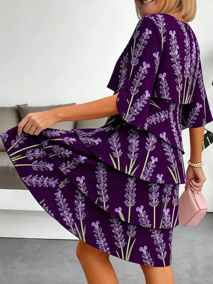 Tiered floral print midi dress with flutter sleeves
