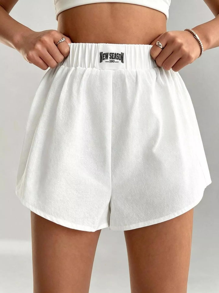 Elastic waist cotton boxer shorts with curved hem
