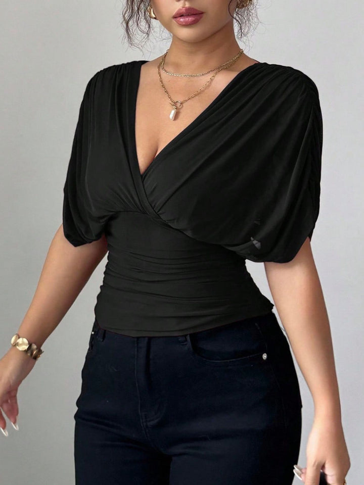 Ruched surplice wrap top with short dolman sleeves