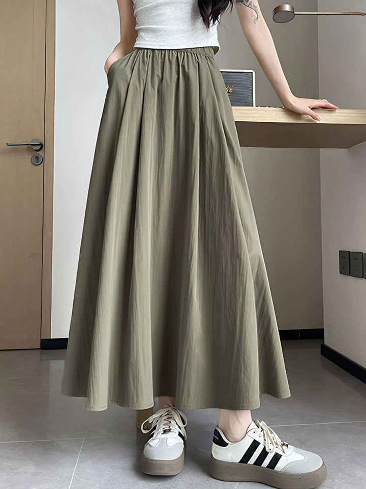 Sage Flowy A-line maxi skirt with elastic waist and pockets