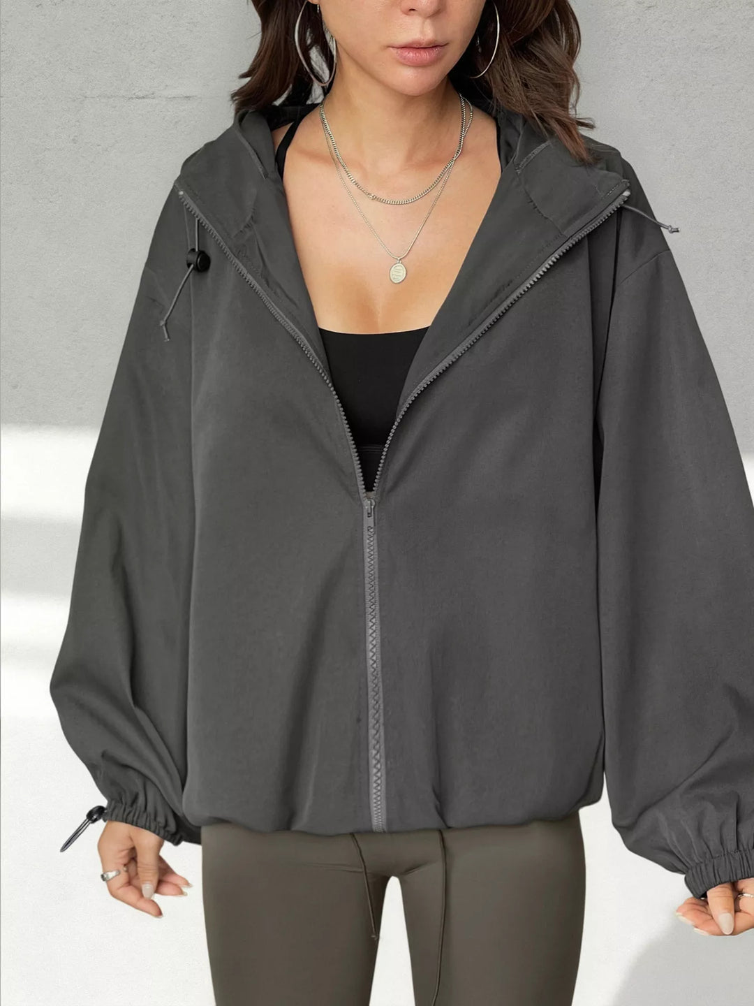 Drawstring hooded zip-up windbreaker jacket with pockets