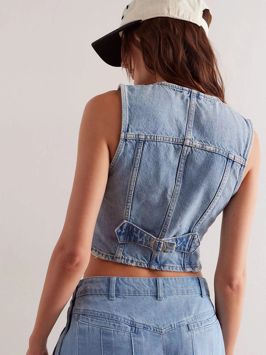 Acid wash button-up denim vest with pointed hem