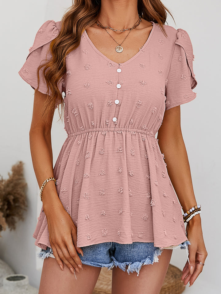 Dusty Pink Swiss dot peplum blouse with flutter sleeves and button front
