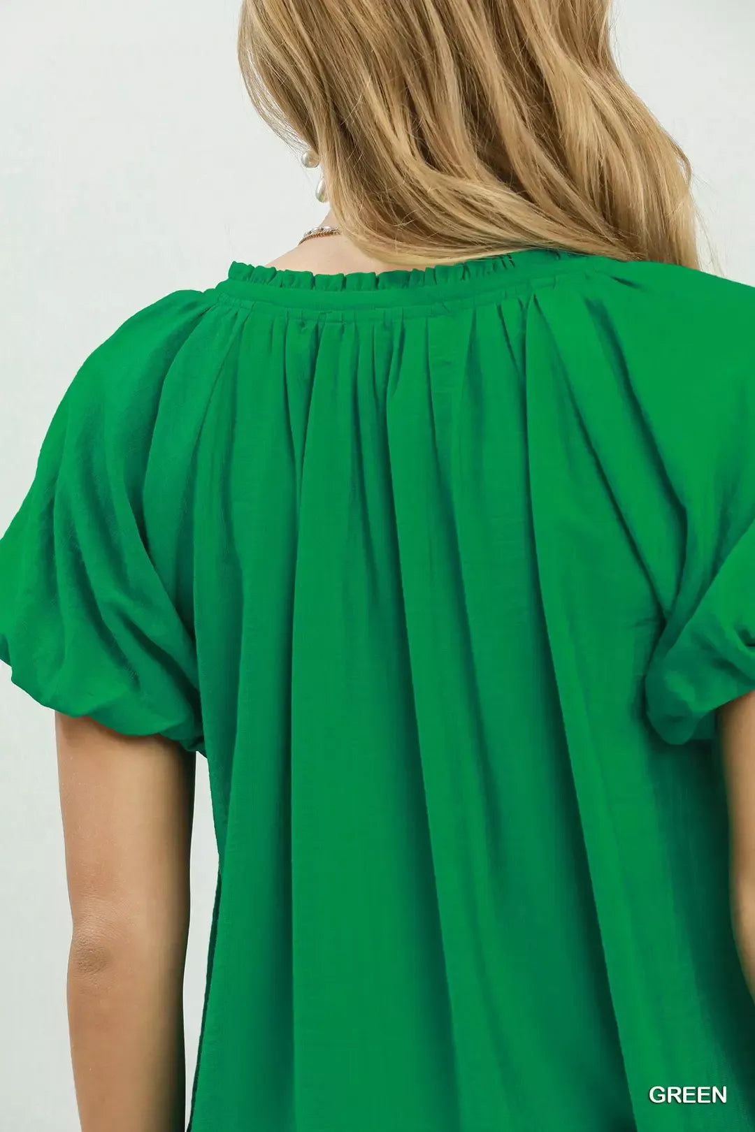 Gathered v-neck top with flutter sleeves