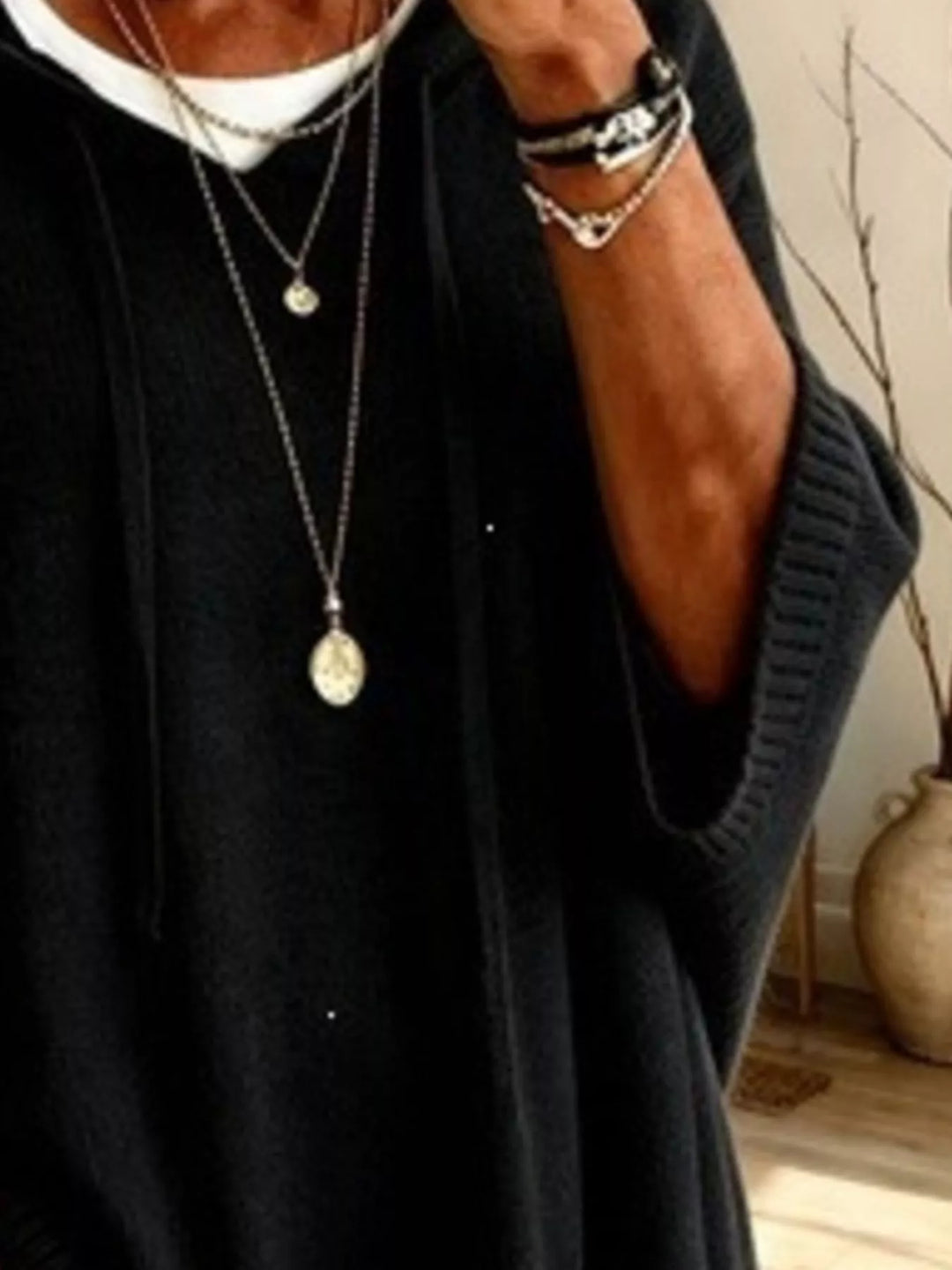 Oversized hooded sweater with drawstring and ribbed trim