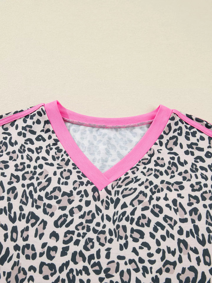Leopard print long sleeve top with contrast V-neck trim