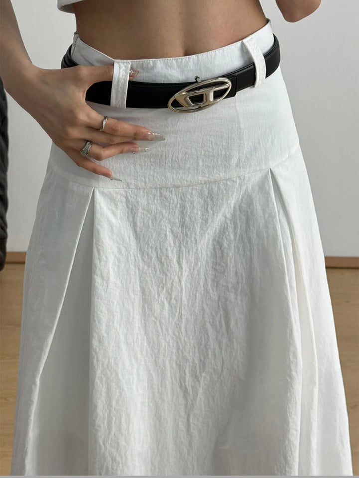 High-rise A-line maxi skirt with front pleats