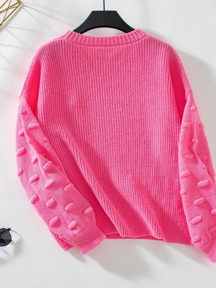 Ribbed knit round neck sweater with chest pocket