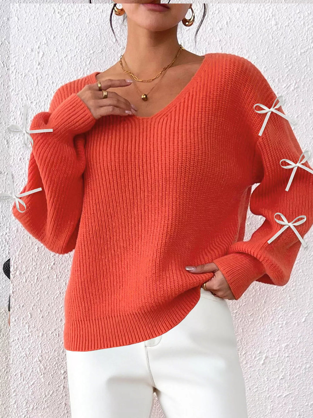 Ribbed knit V-neck sweater with bow-tie sleeves
