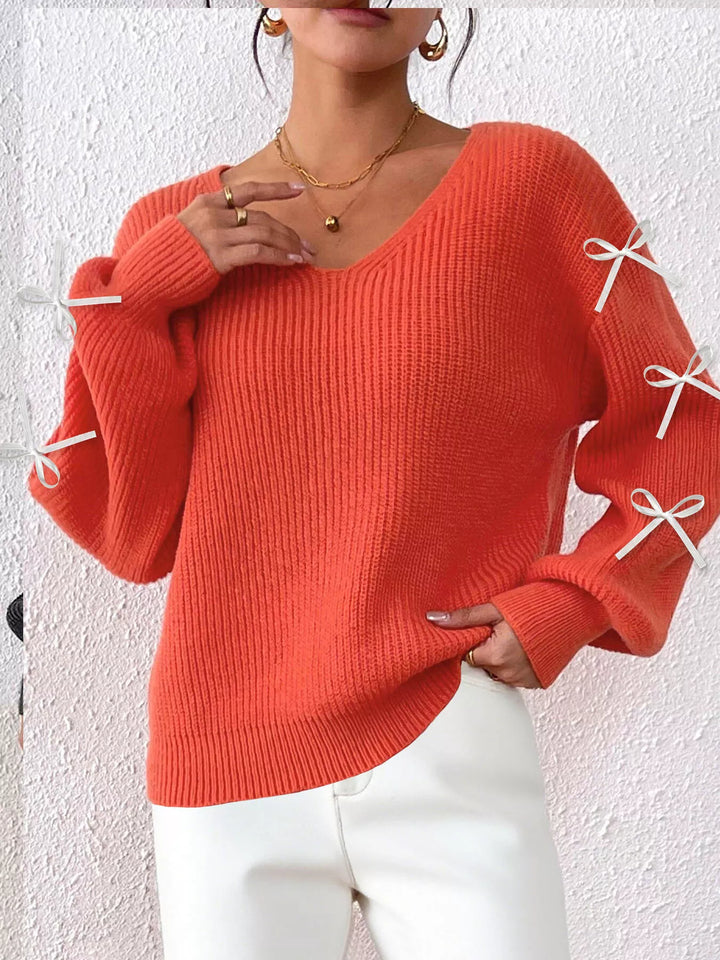 Ribbed knit V-neck sweater with bow-tie sleeves