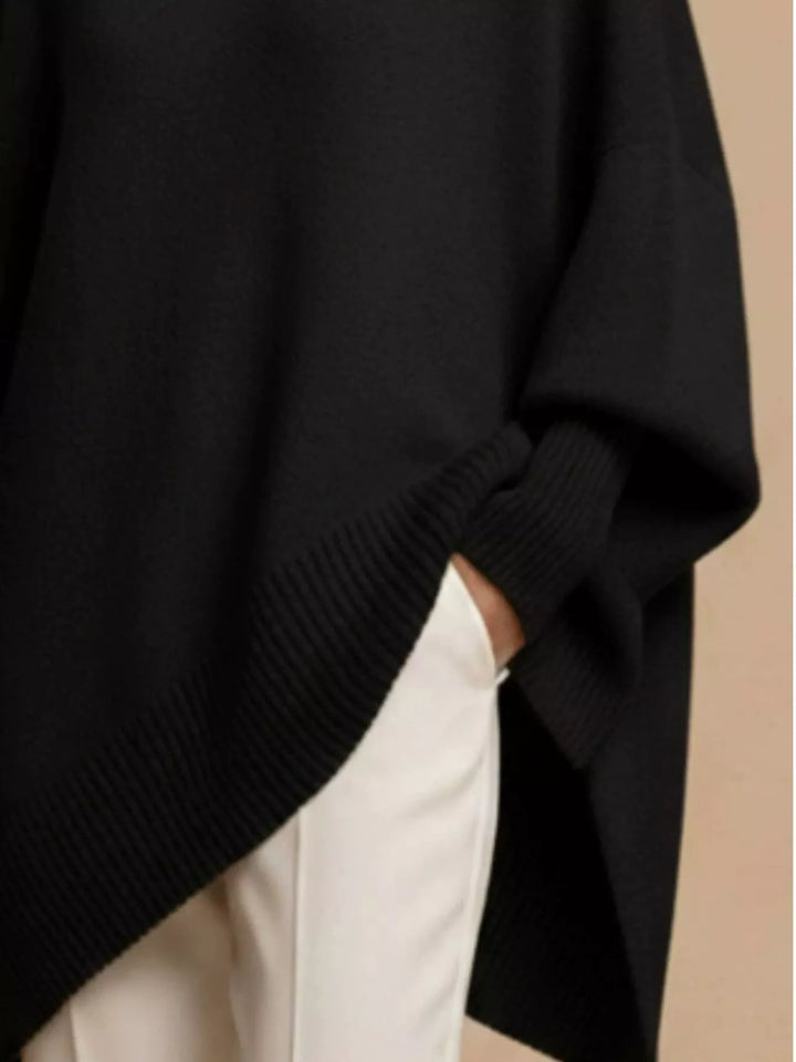 Batwing sleeve asymmetric hem oversized knit sweater