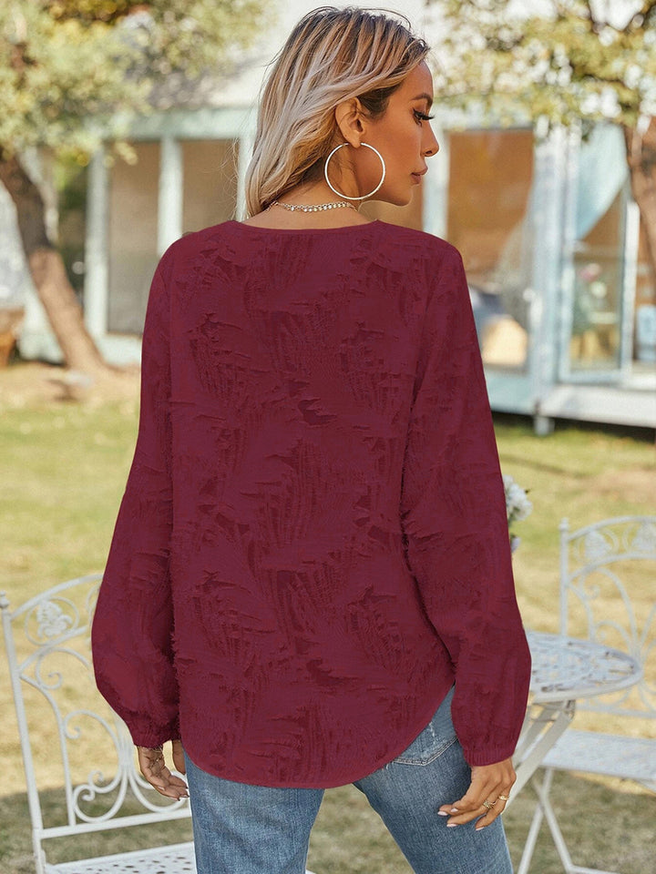 Textured v-neck blouse with balloon sleeves