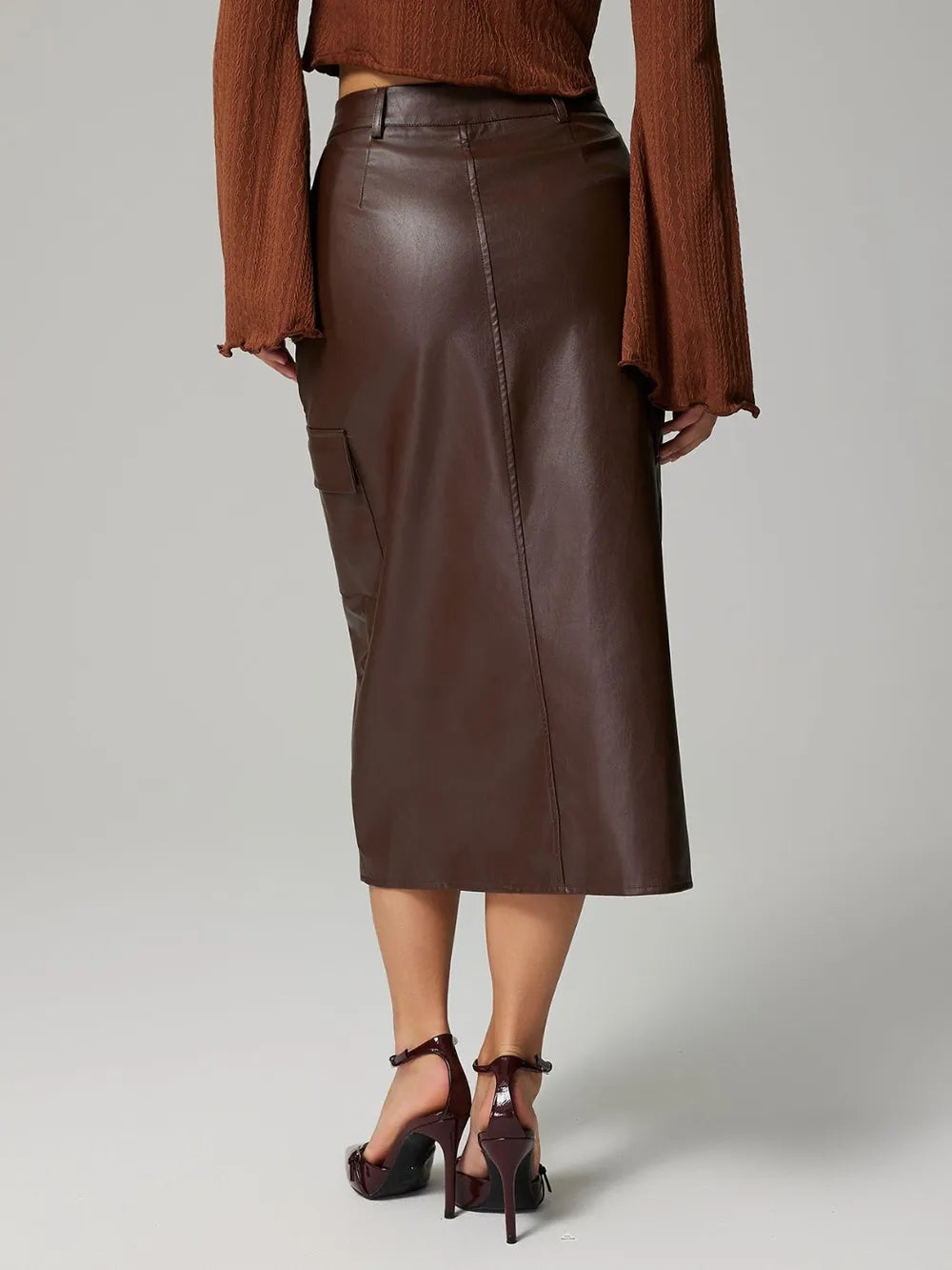High-rise faux leather midi skirt with cargo pockets and slit