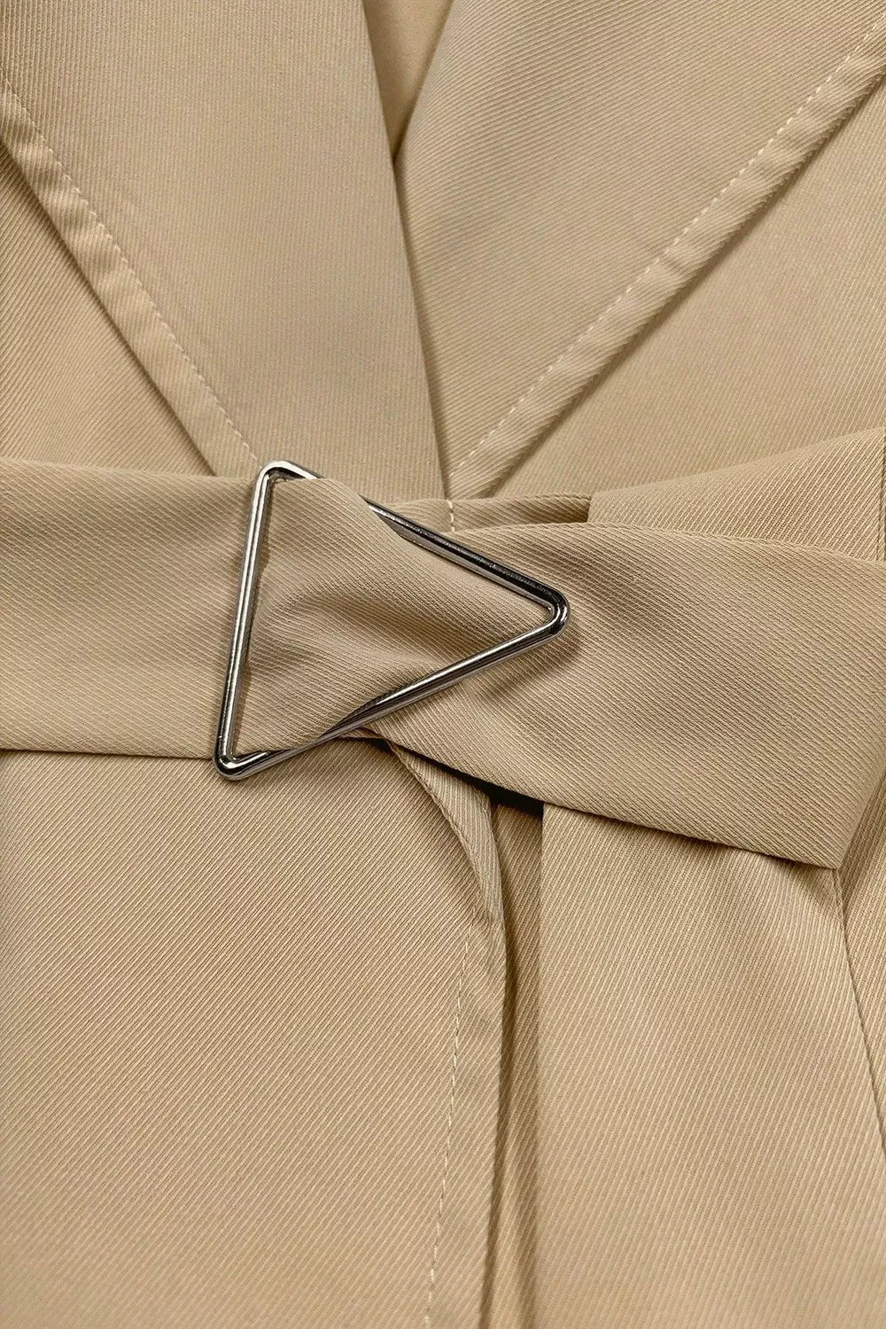Wide lapel belted trench coat with epaulette tabs