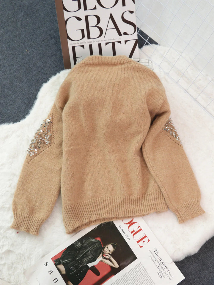 Sequined diamond pointelle knit oversized sweater