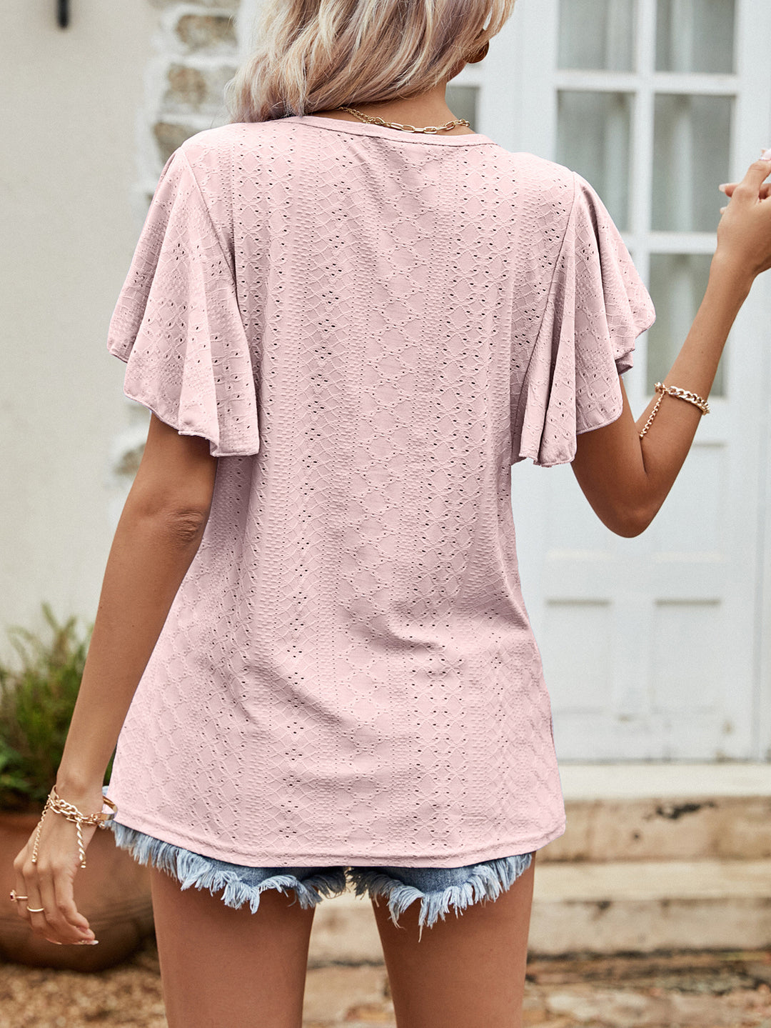Eyelet flutter sleeve round neck tunic blouse