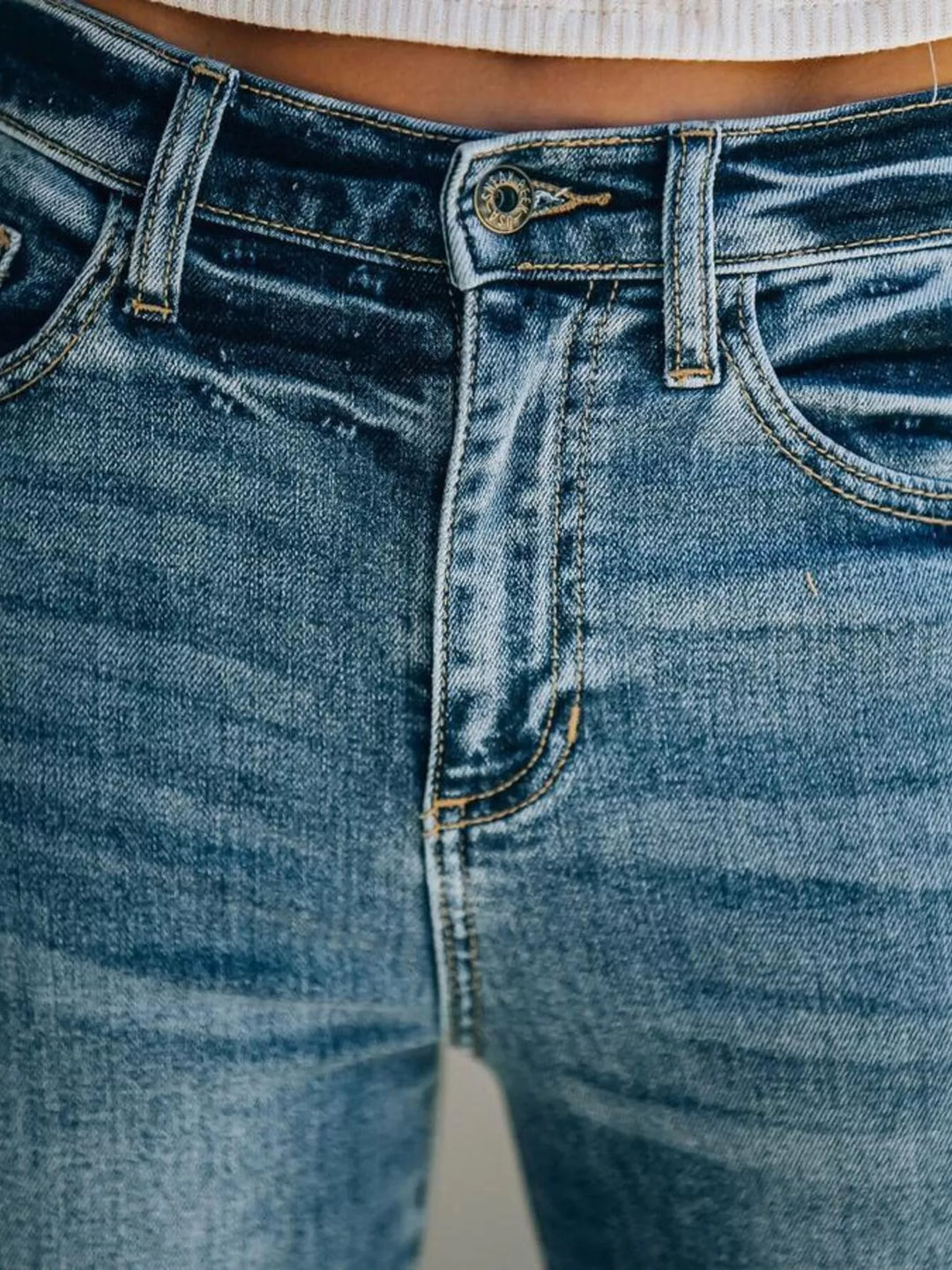 High-rise wide leg jeans with raw frayed hem