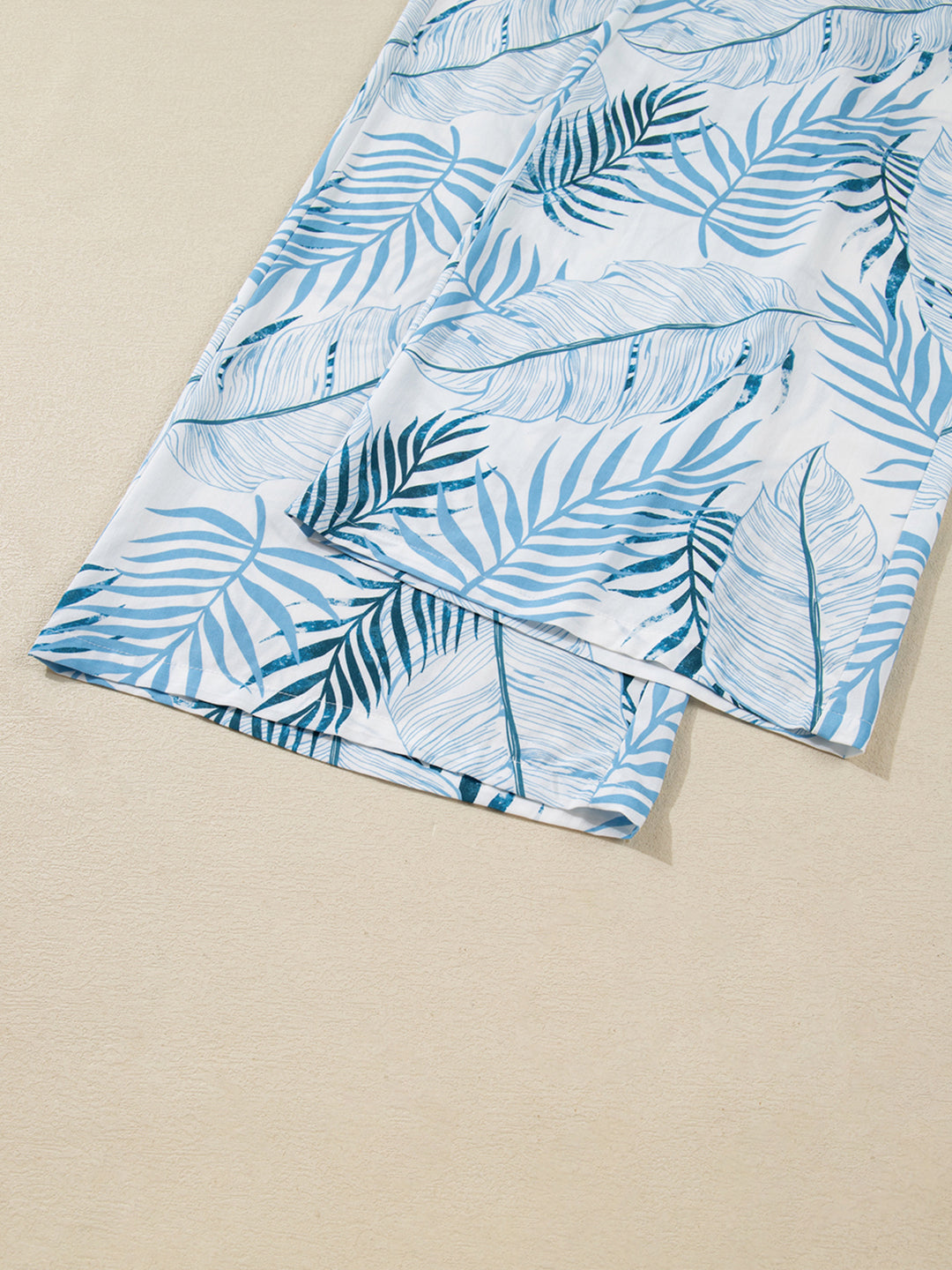 Tropical leaf print shirred-waist wide-leg pants