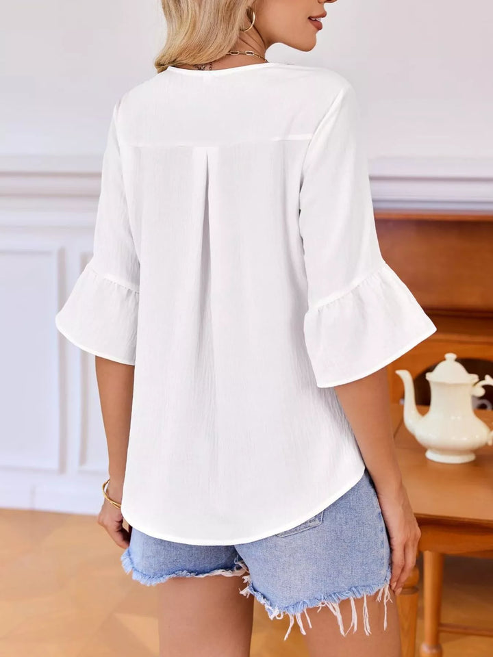 Ruffle trim V-neck blouse with flared bell sleeves