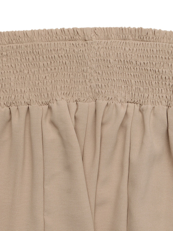 Smocked high-waist wide-leg cotton pants with pockets