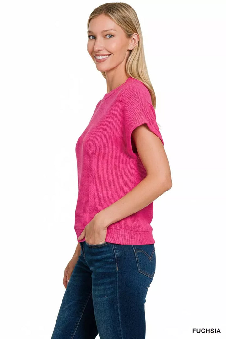 Waffle knit short sleeve sweater with banded hem