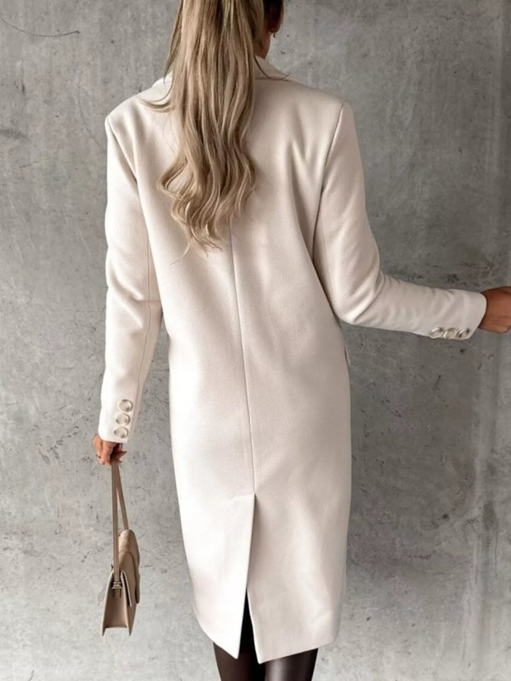 Double-breasted longline coat with notch lapel and flap pockets