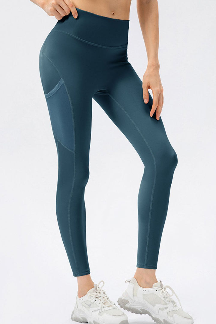 Deep Teal High-rise workout leggings with mesh side pockets