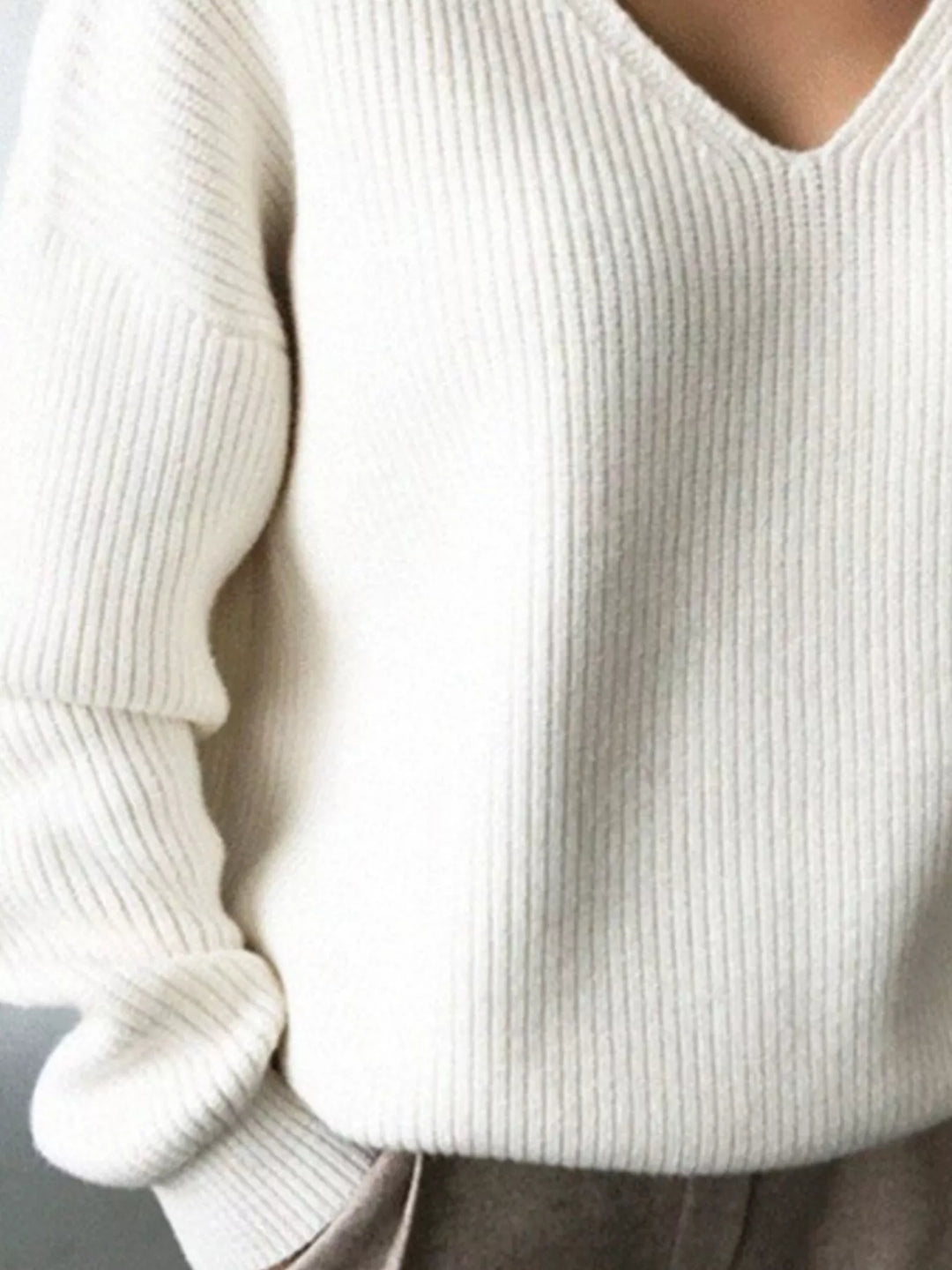 Ribbed knit V-neck sweater with dropped shoulders