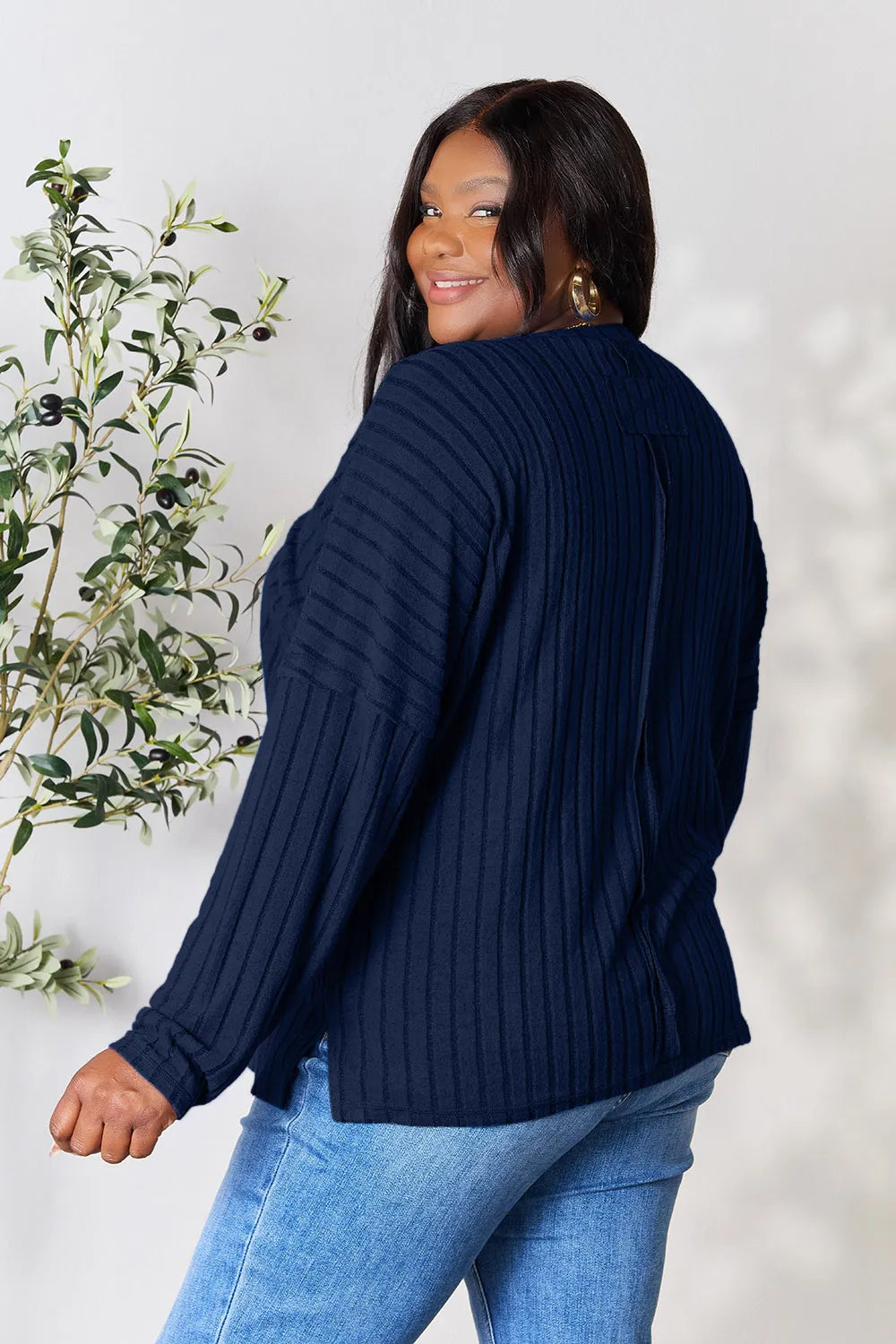 Ribbed knit round neck tunic top with side slits