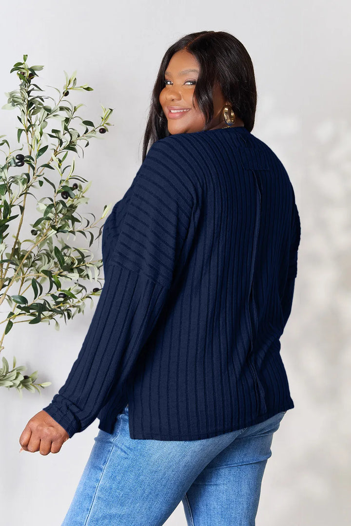 Ribbed knit round neck tunic top with side slits