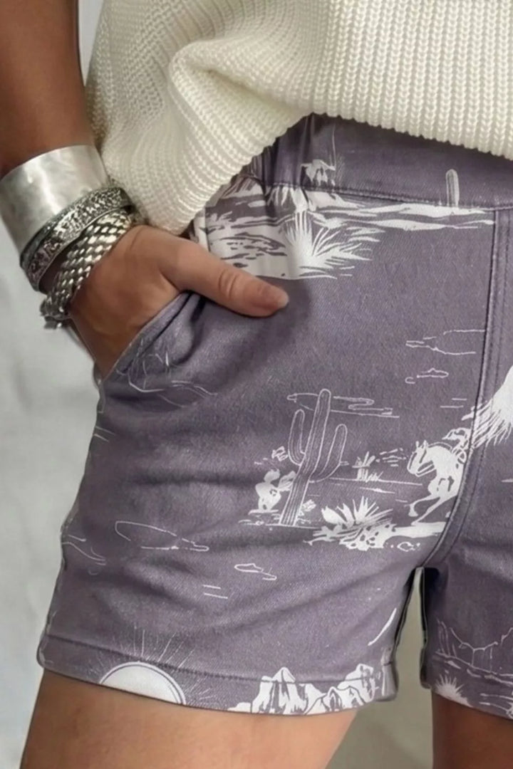 Western desert scene denim shorts with pockets