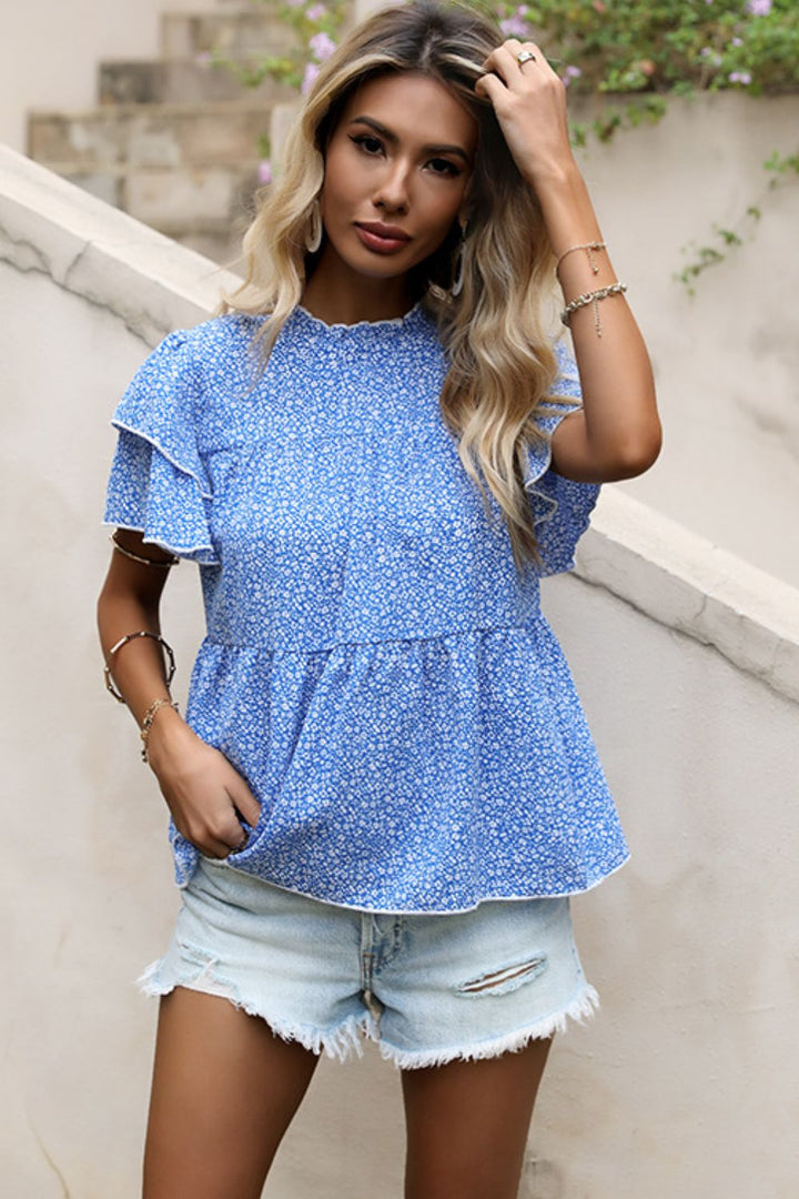 Ditsy floral peplum blouse with layered flutter sleeves