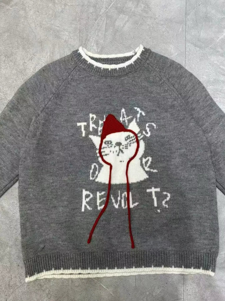 Cat graphic raglan sleeve knit sweater with contrast trim