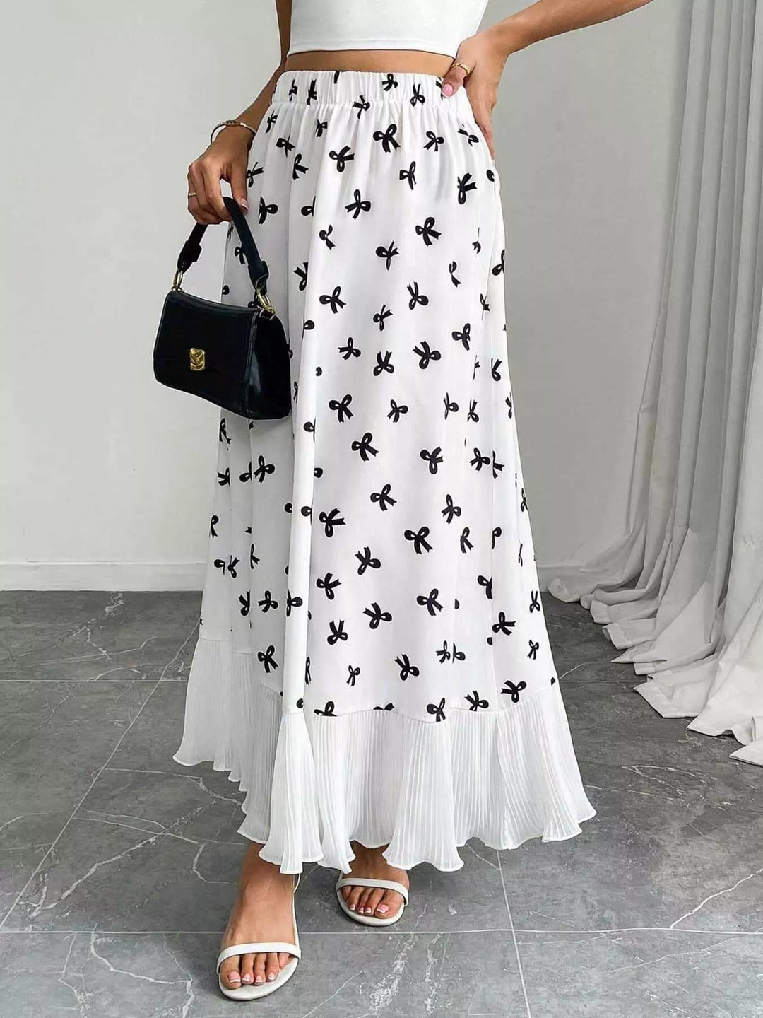 Bow-print flowy maxi skirt with pleated ruffle hem