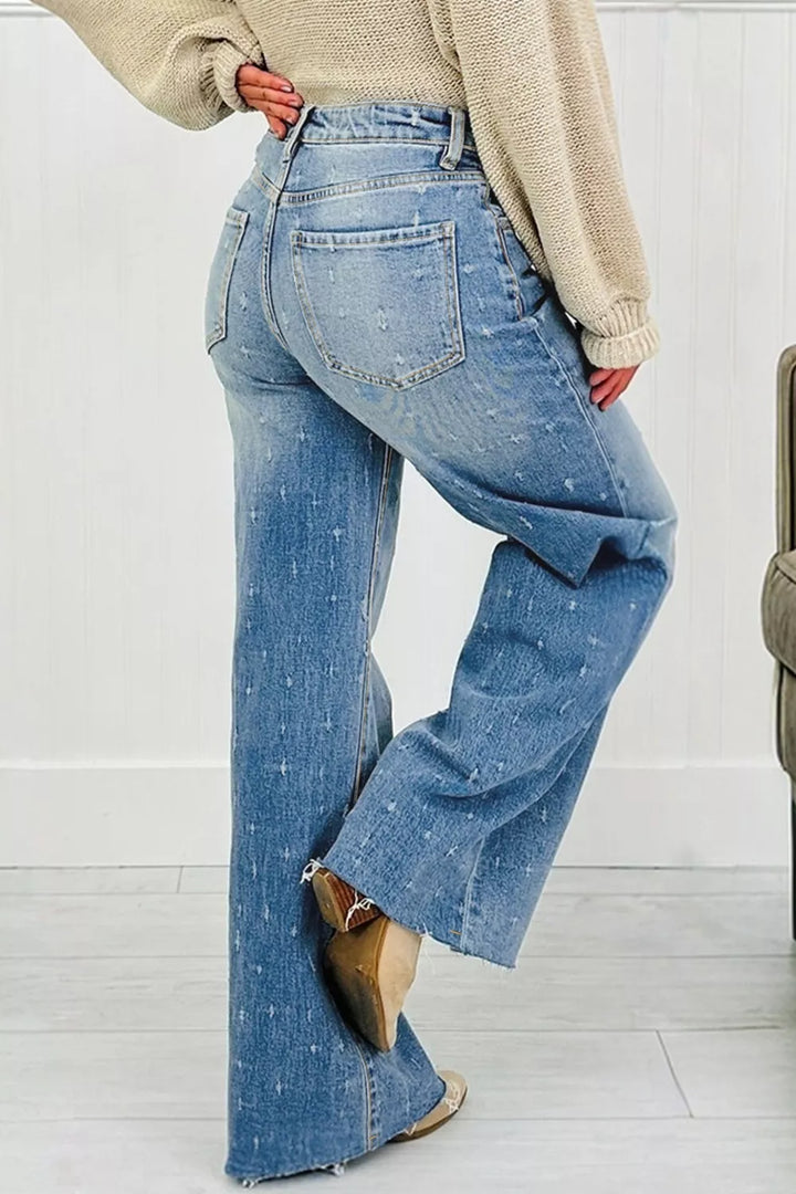 Distressed wide-leg jeans with tummy control and raw hem