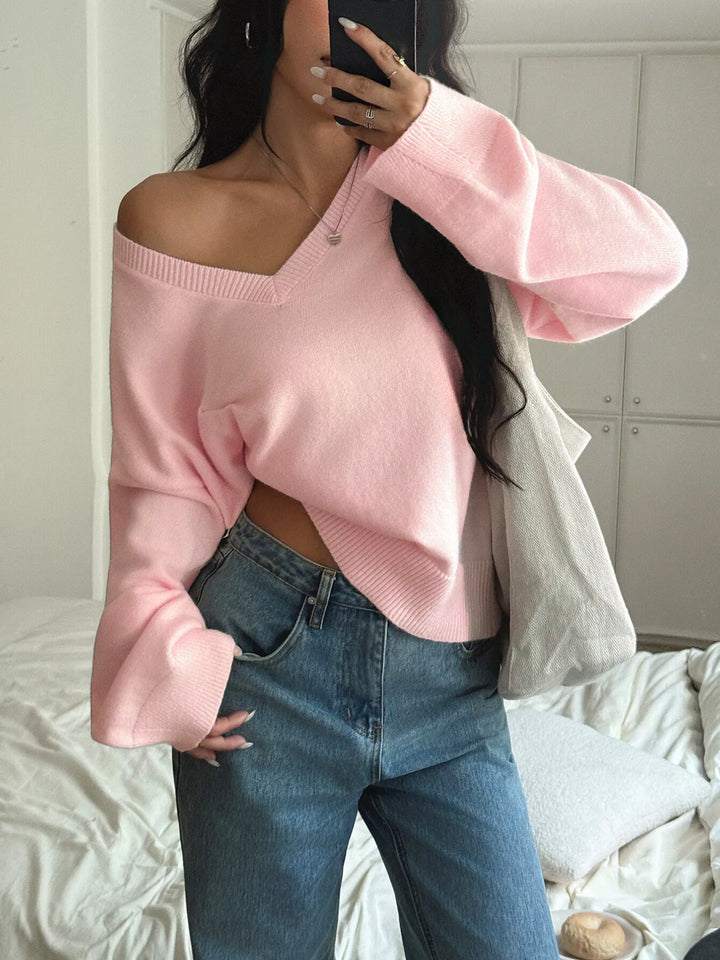 Blush Pink V-neck loose knit sweater with ribbed trim