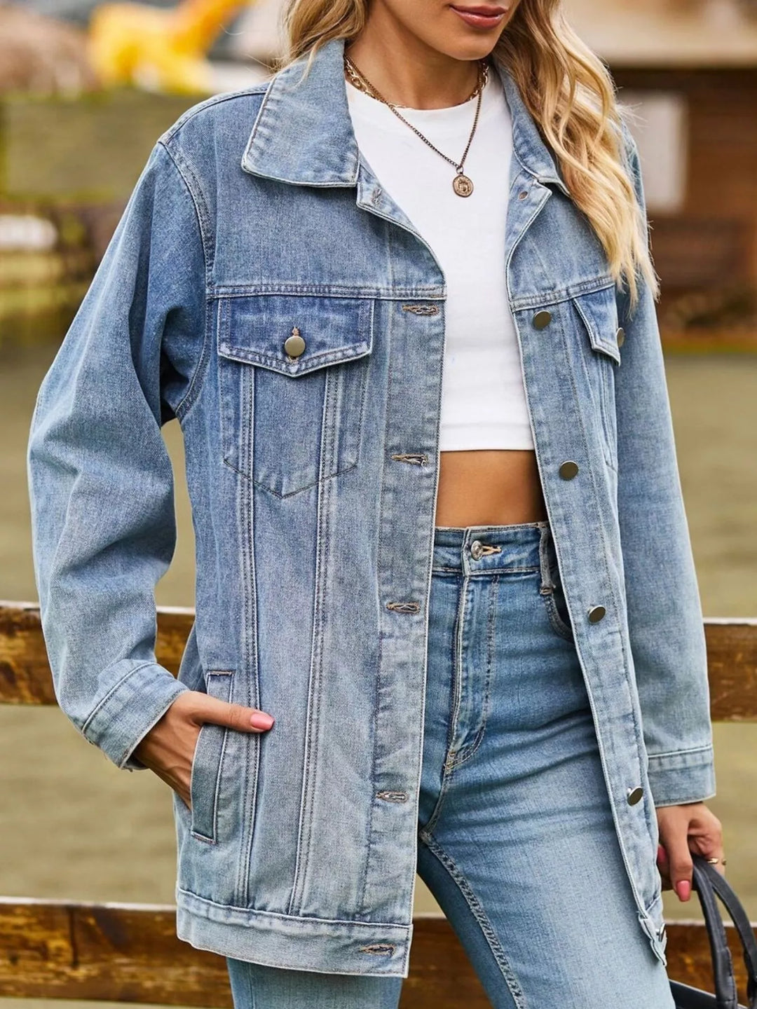 Oversized washed denim jacket with flap pockets