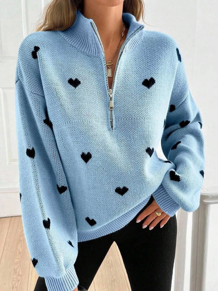 Heart print half-zip mock neck sweater with drop shoulders