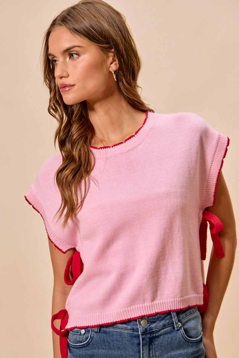 Dolman sleeve knit sweater top with side ribbon ties