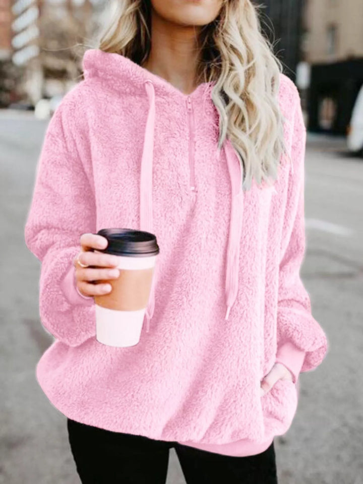 Pink Plush half-zip fleece hoodie with drawstring hood and pockets