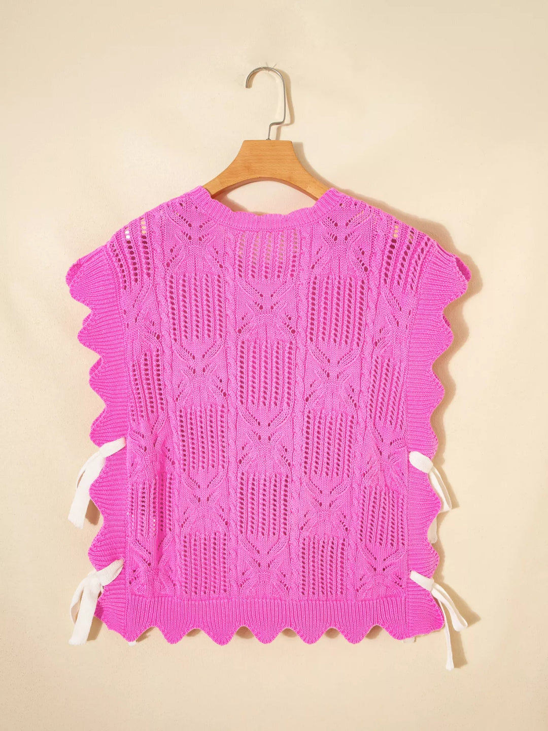 Openwork cable knit crop top with side ties and ruffle sleeves